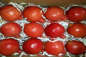 Pomegranates with papercutting inside a box ready for import and export